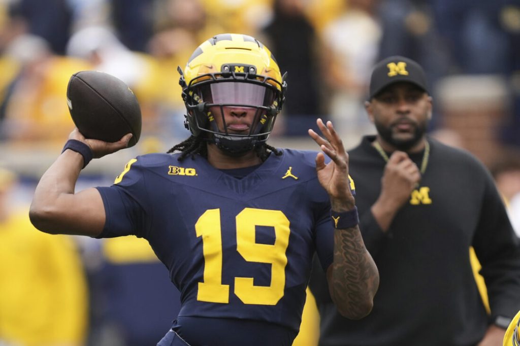 Michigan football marching and tripping through the their Schedule 